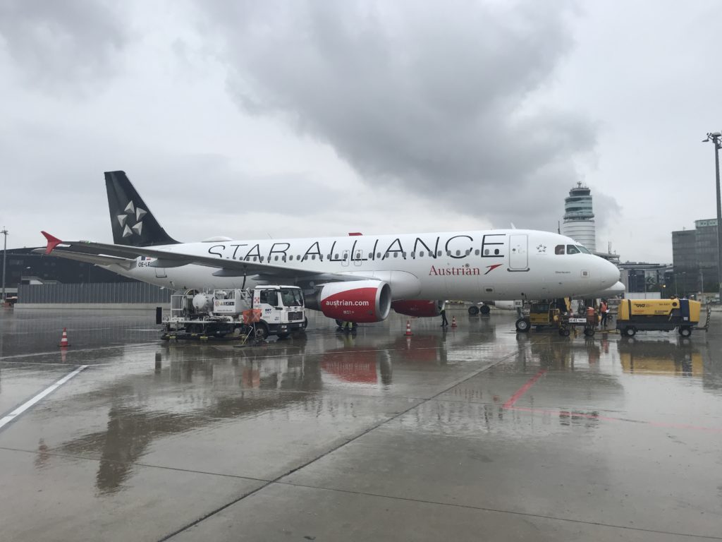 a plane parked on a tarmac
