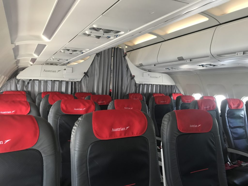 a plane with seats and a window
