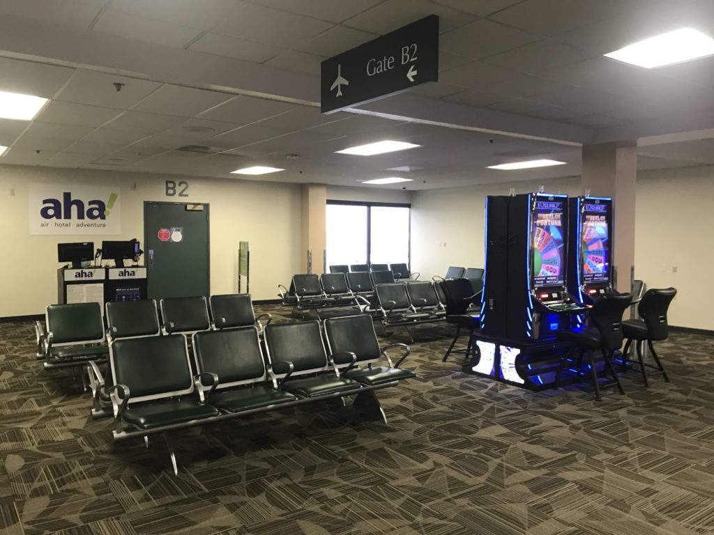 a room with chairs and arcade games