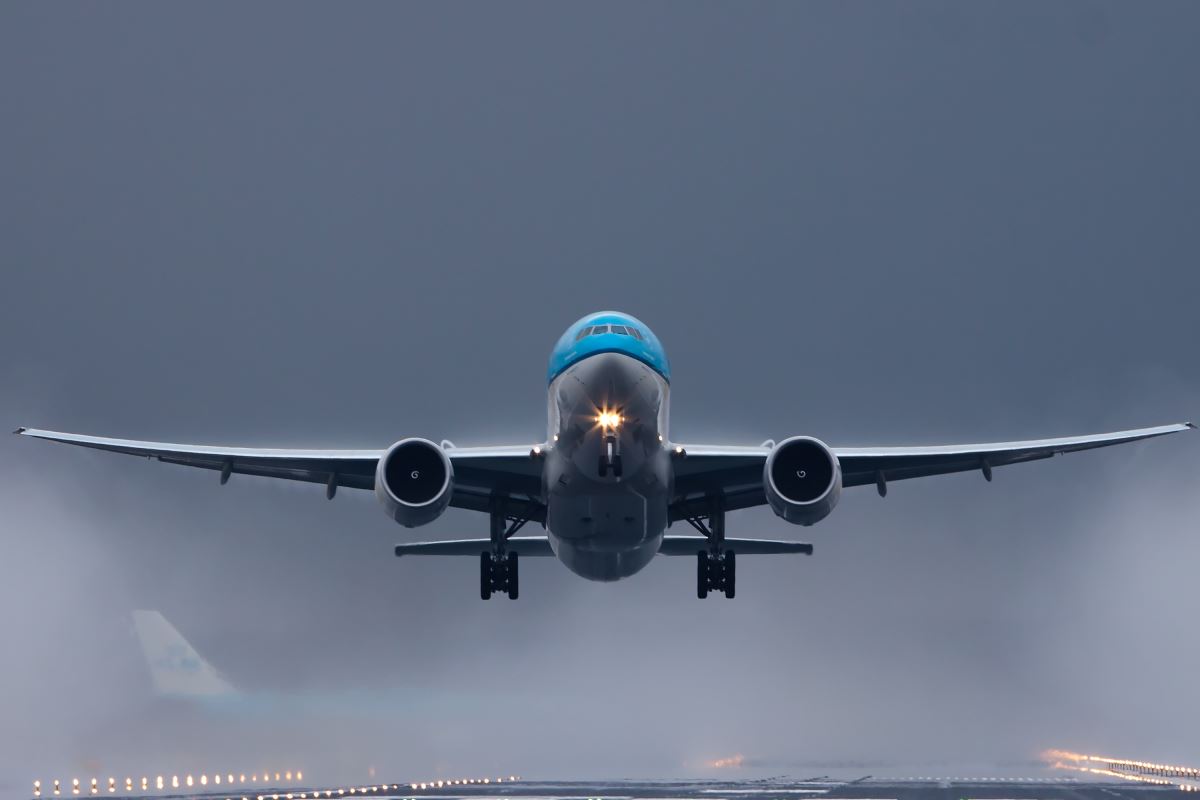 a plane flying in the sky