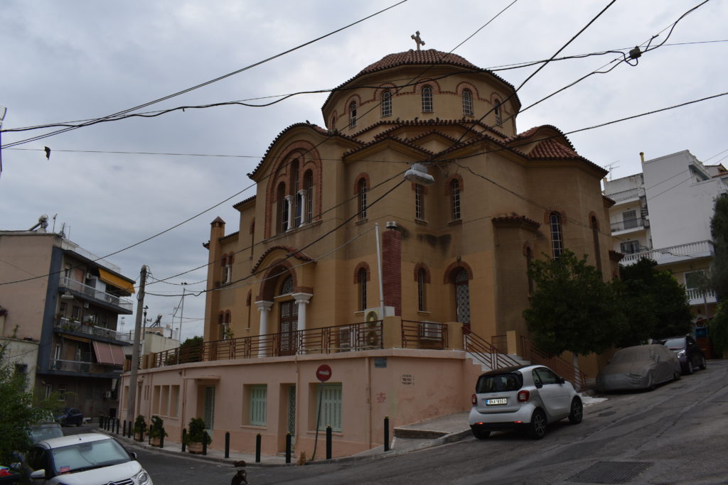 a building with a cross on the roof