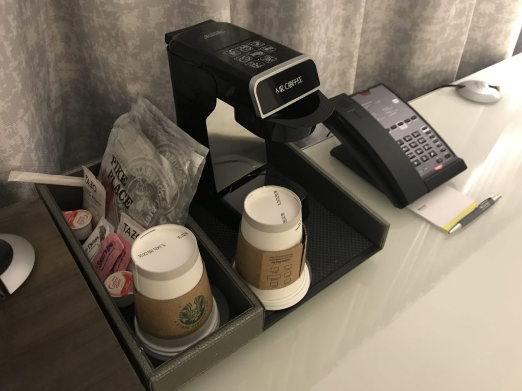 a coffee machine and coffee cups