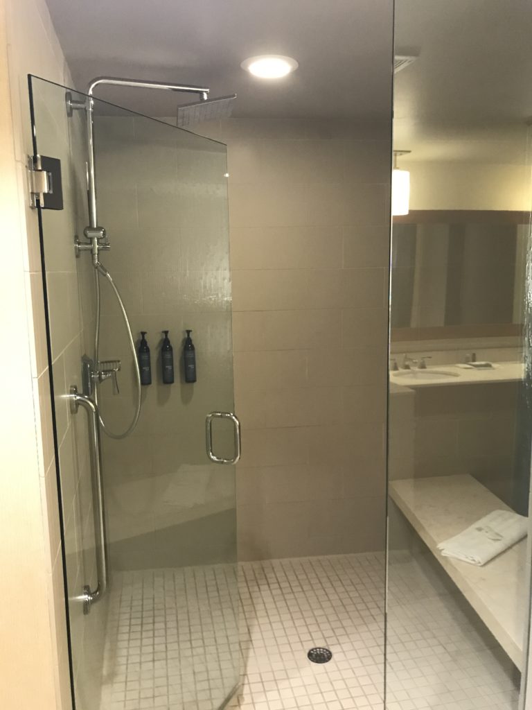 a shower with a glass door