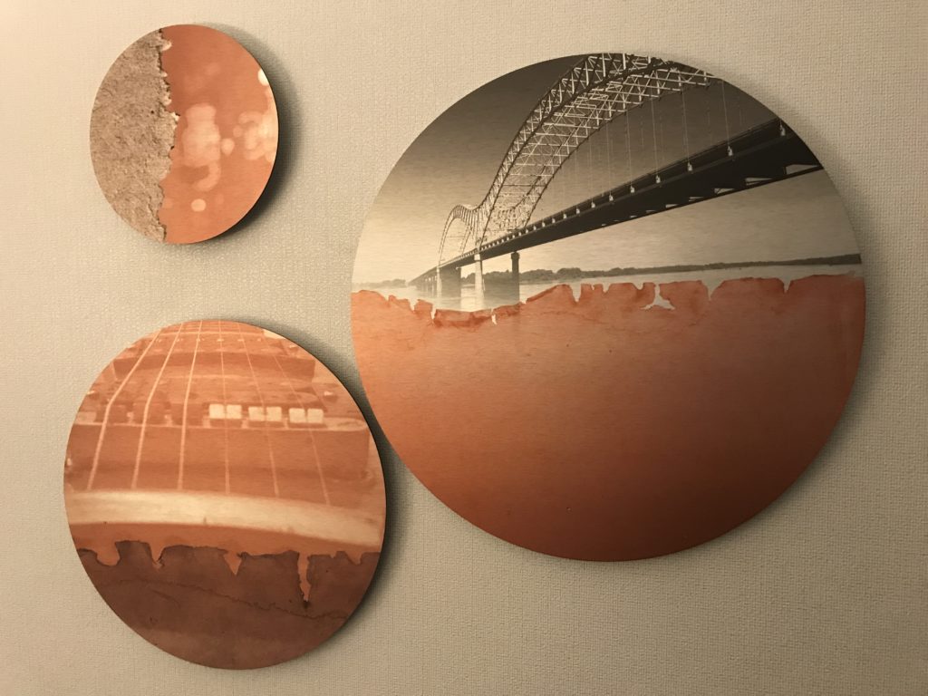 a circular coasters with a bridge and a bridge