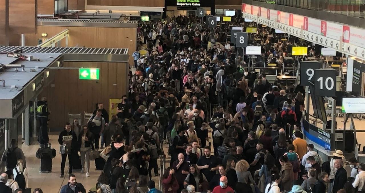 a large crowd of people in a terminal