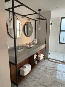 a bathroom with a double sink