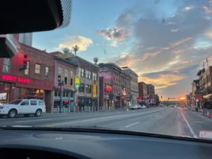 a street with buildings and cars on it