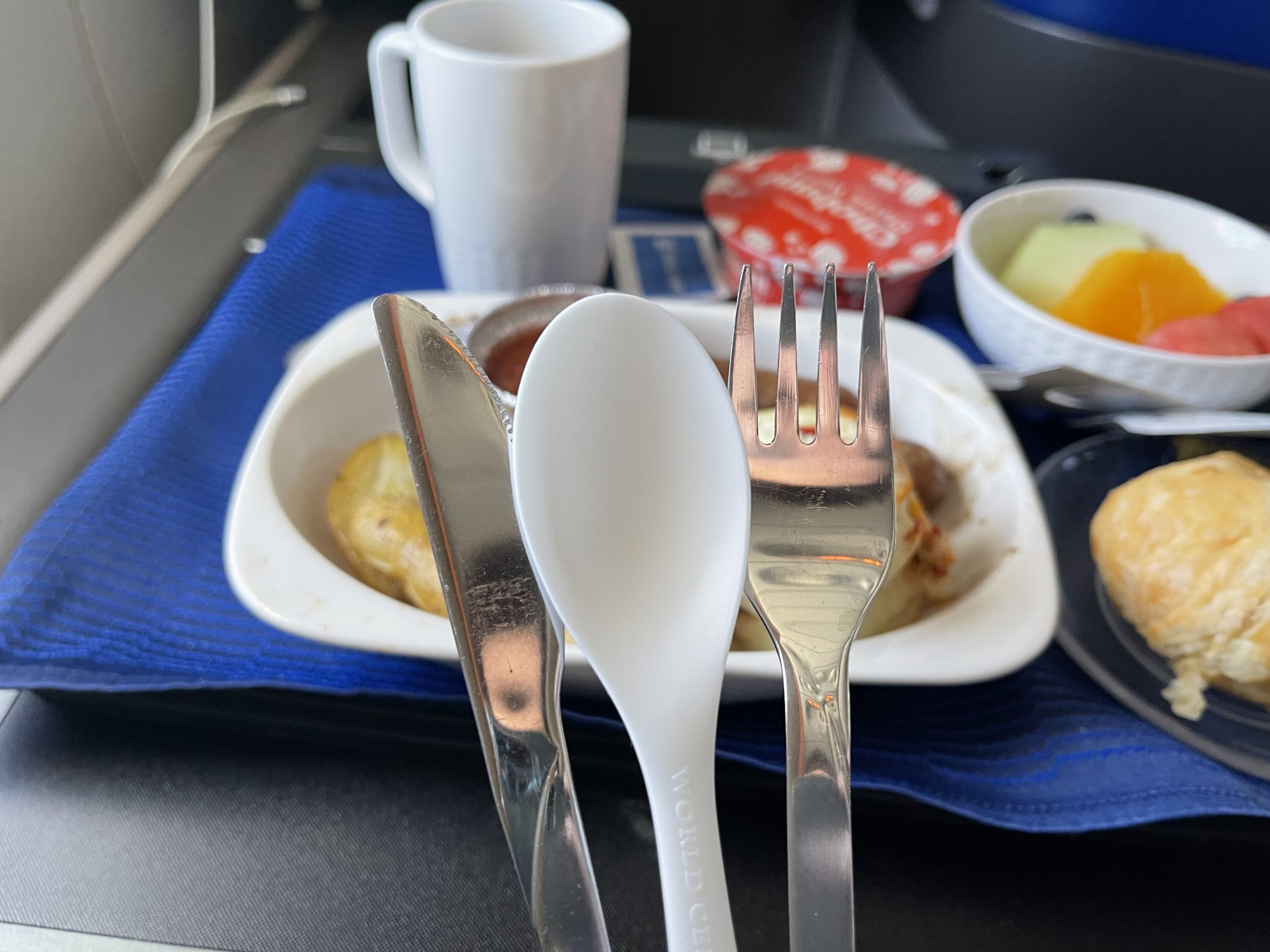 a spoon and fork on a tray