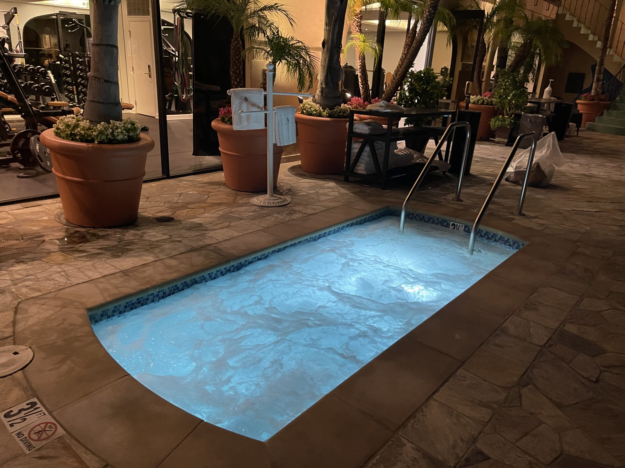 a pool with a blue light