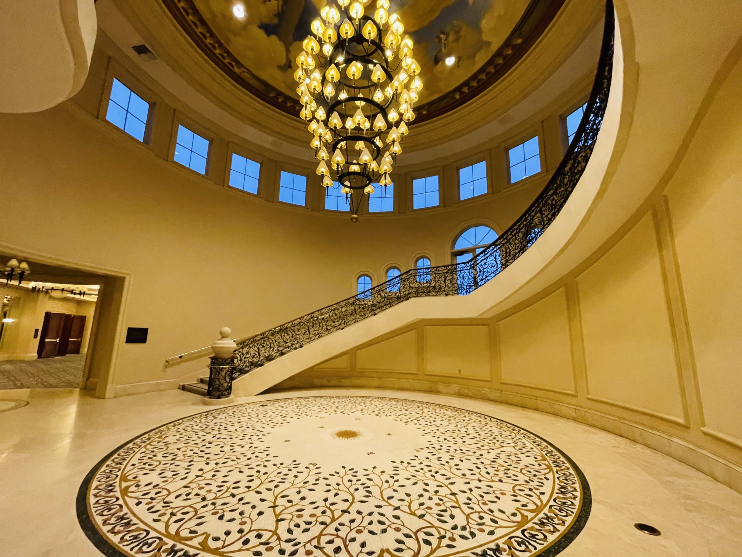 a chandelier in a circular staircase