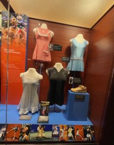 a display of dresses on mannequins