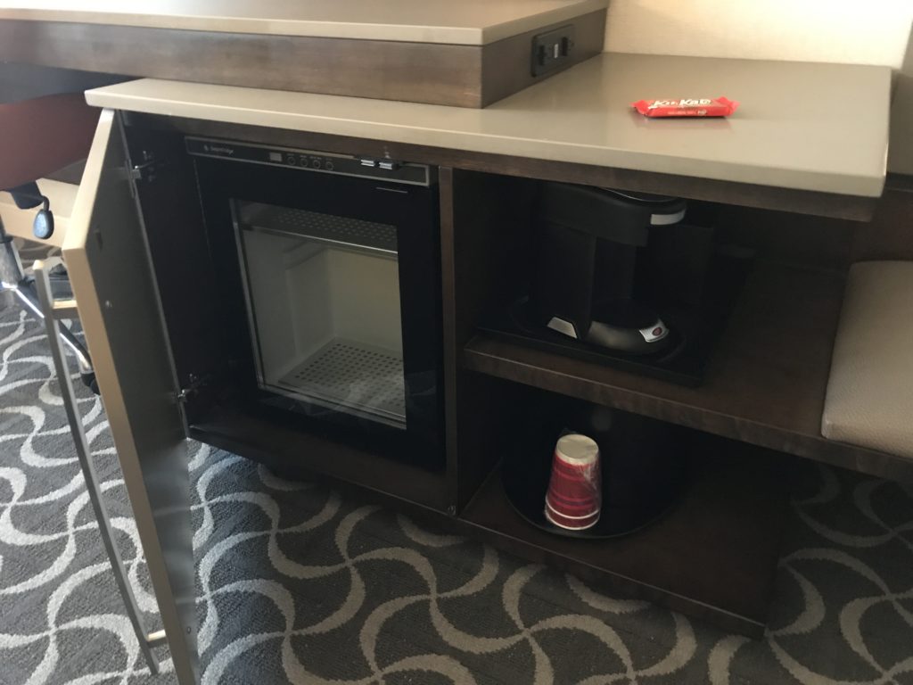 a small refrigerator in a room