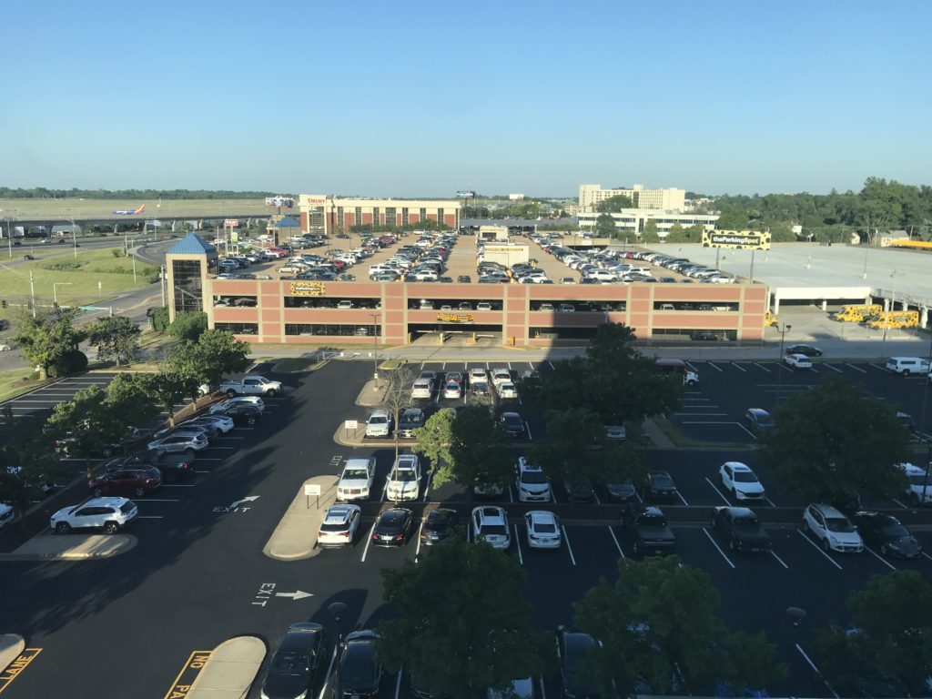 a parking lot with many cars