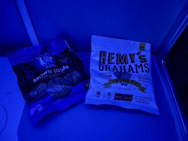 a bag of cookies on a blue surface