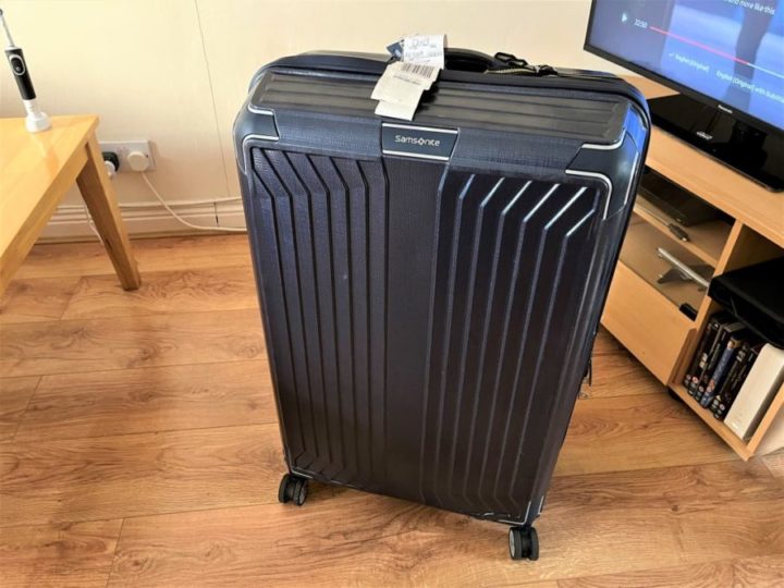 a suitcase on a wood floor