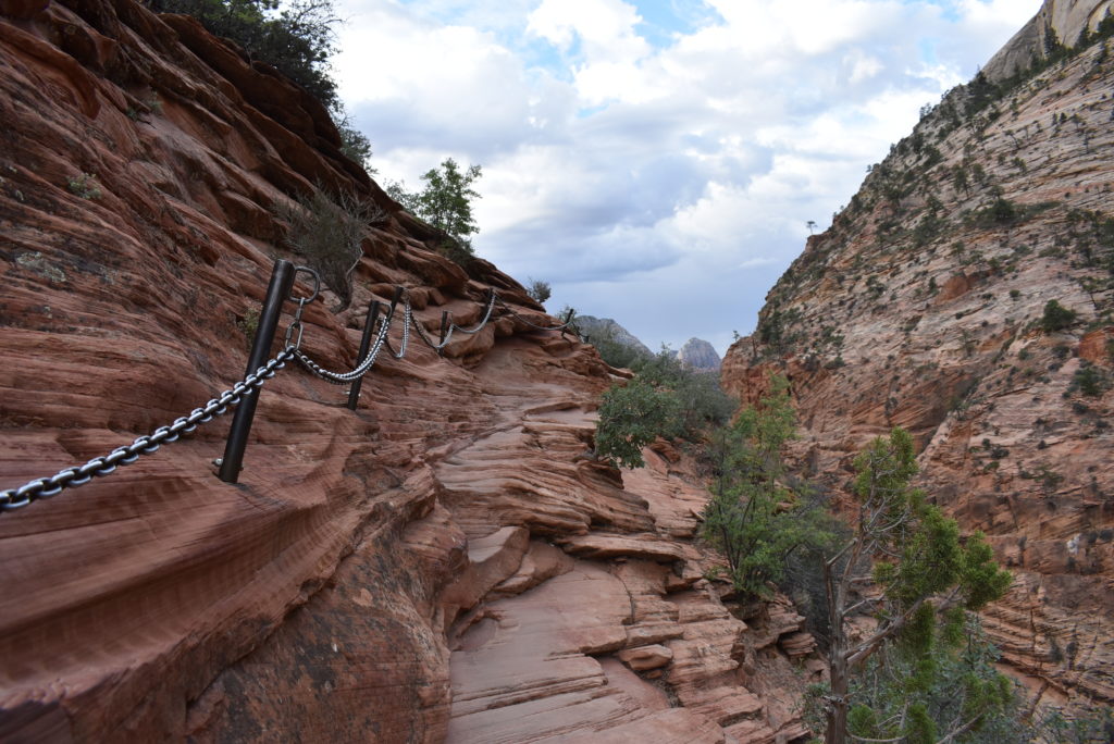 a chain on a rocky cliff