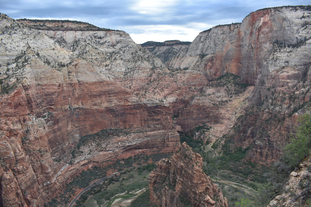 a large canyon with a winding road