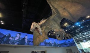 a large dinosaur in a room