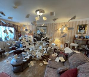 a room with many papers flying in the air