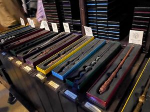a row of magic wands in boxes