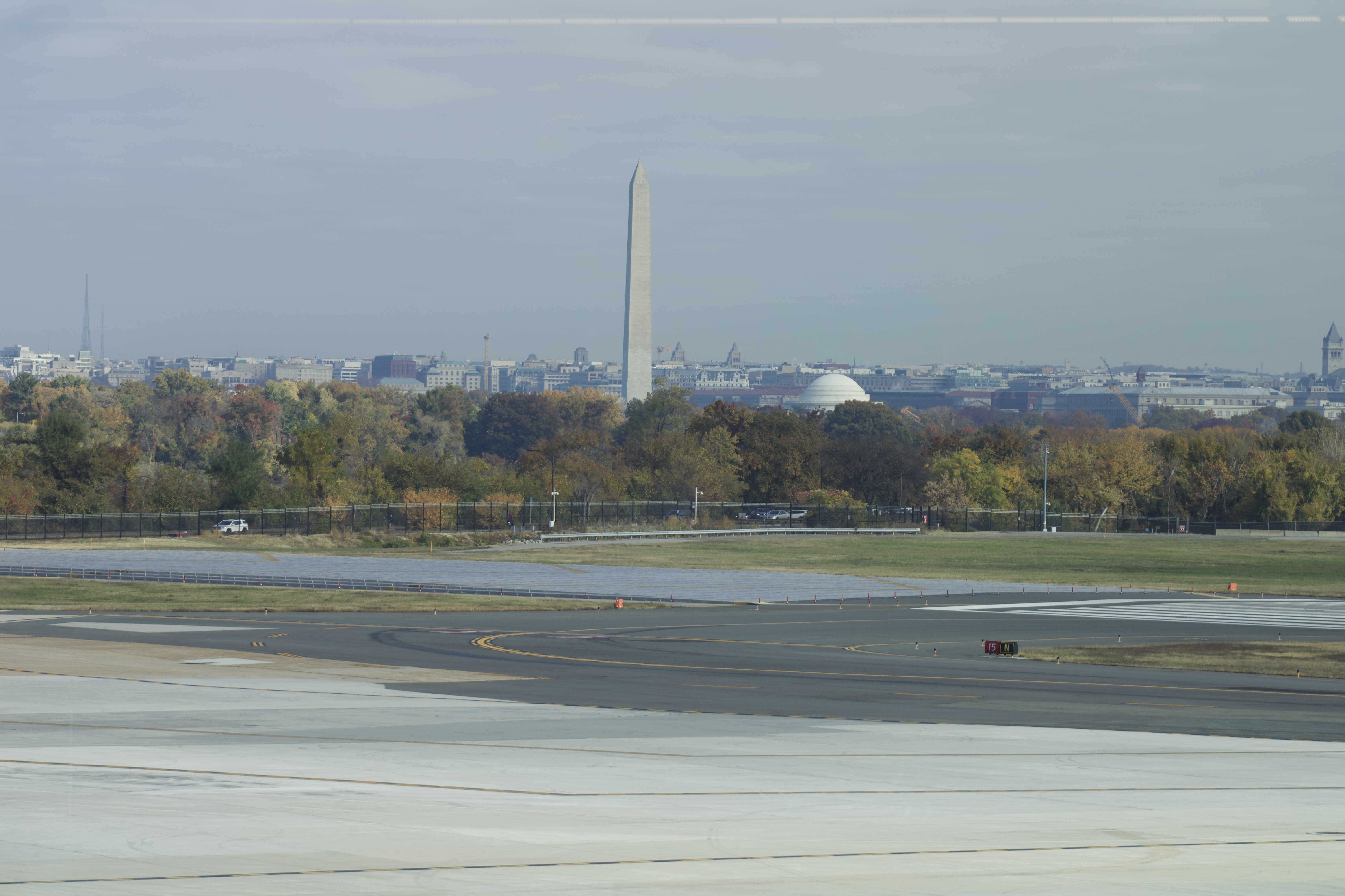 View of the north end of Washington National Airport with Washington DC in the background.
