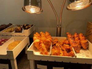 a tray of pastries and a lamp