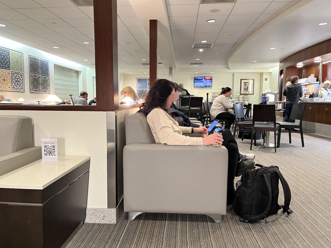 a group of people sitting in a waiting room