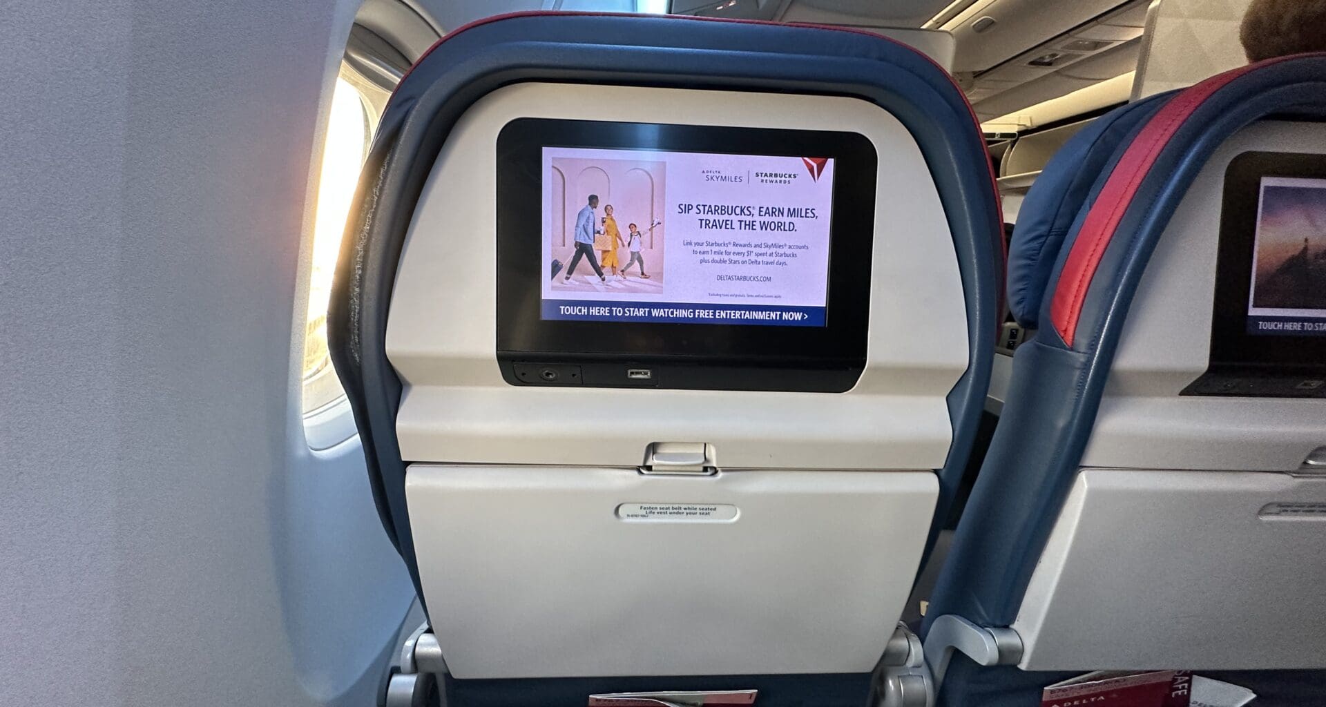 a screen on the back of an airplane