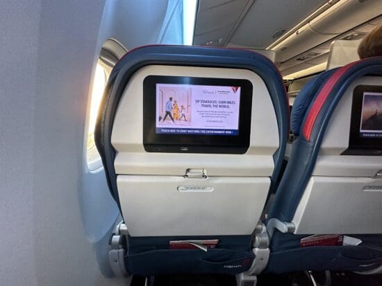 a screen on the back of an airplane