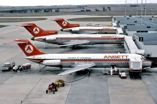 several airplanes at an airport