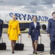 a group of people in uniform with luggage