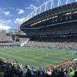 a football field with people in the stands