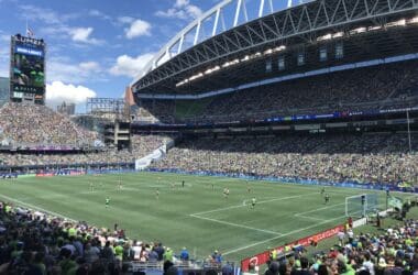 a football field with people in the stands