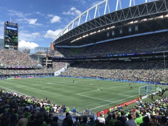 a football field with people in the stands