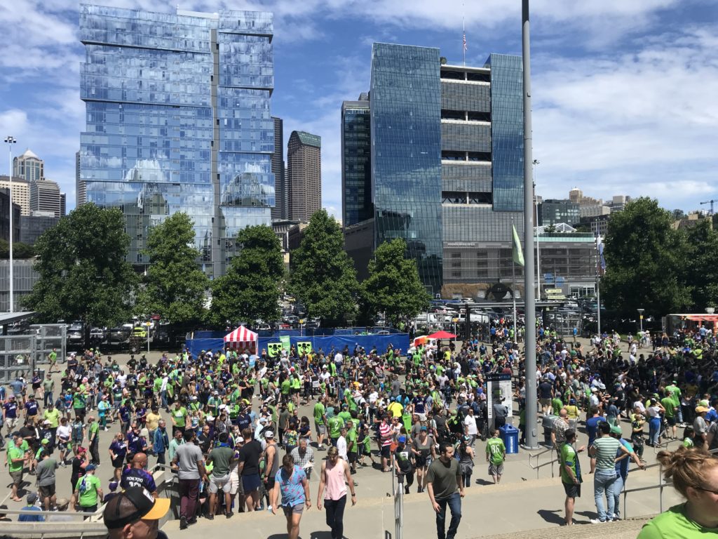 a large crowd of people in a city