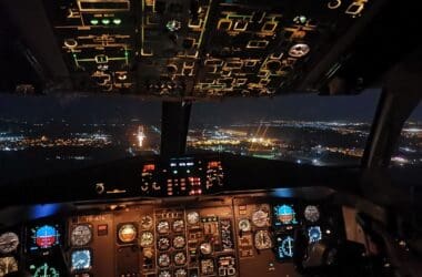 a cockpit of an airplane at night