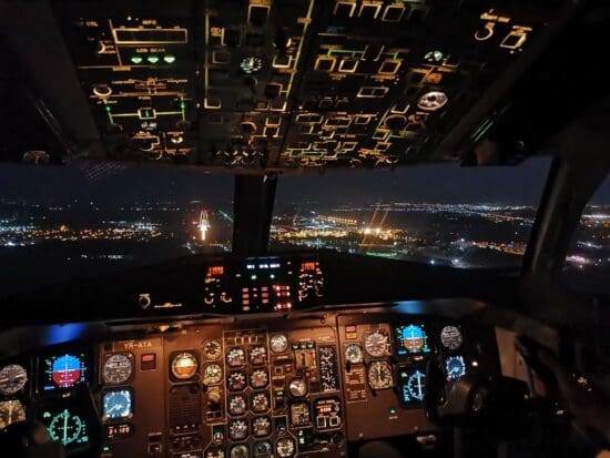 a cockpit of an airplane at night