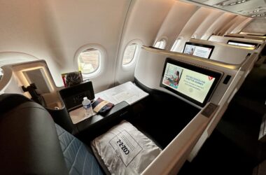 a seat and table in an airplane