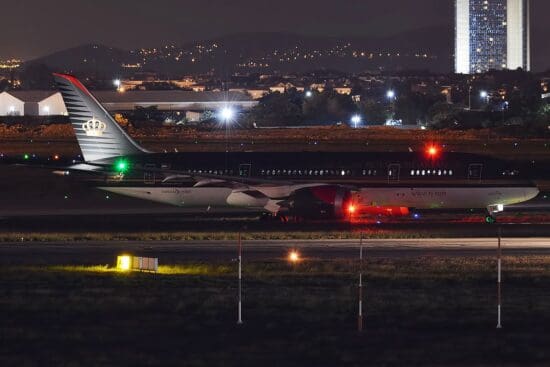 a plane on a runway at night