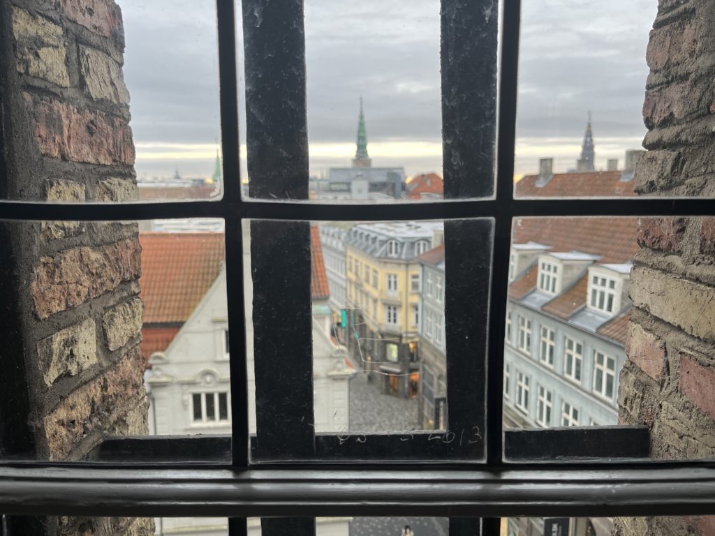 a window with a view of a city