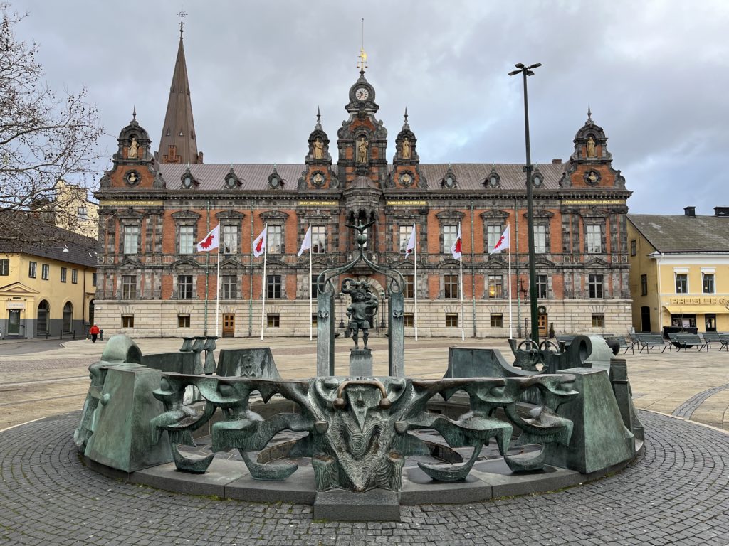 a building with a fountain in front of it