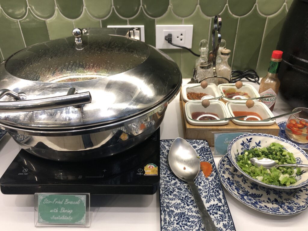 Stir-fried broccoli and shrimp bowl at the buffet