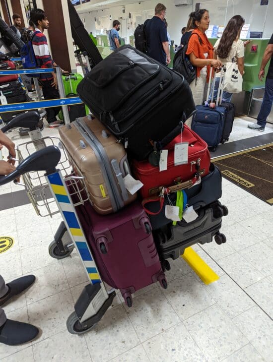 a group of luggage on a cart