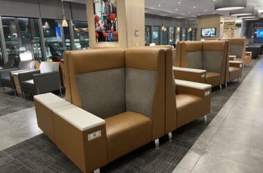 a group of brown chairs in a room