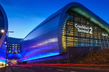 a building with a curved glass wall