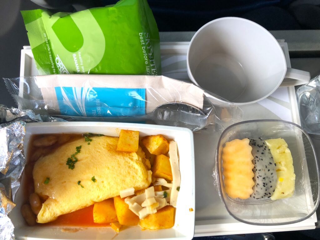 food on a tray on a plane