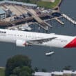 a plane flying over water