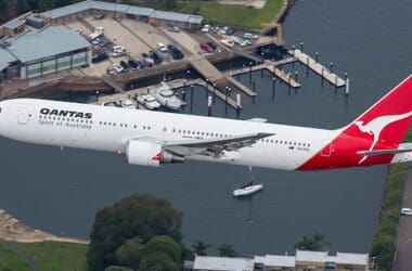 a plane flying over water