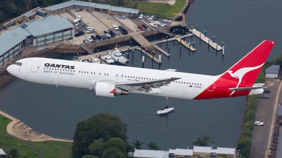 a plane flying over water