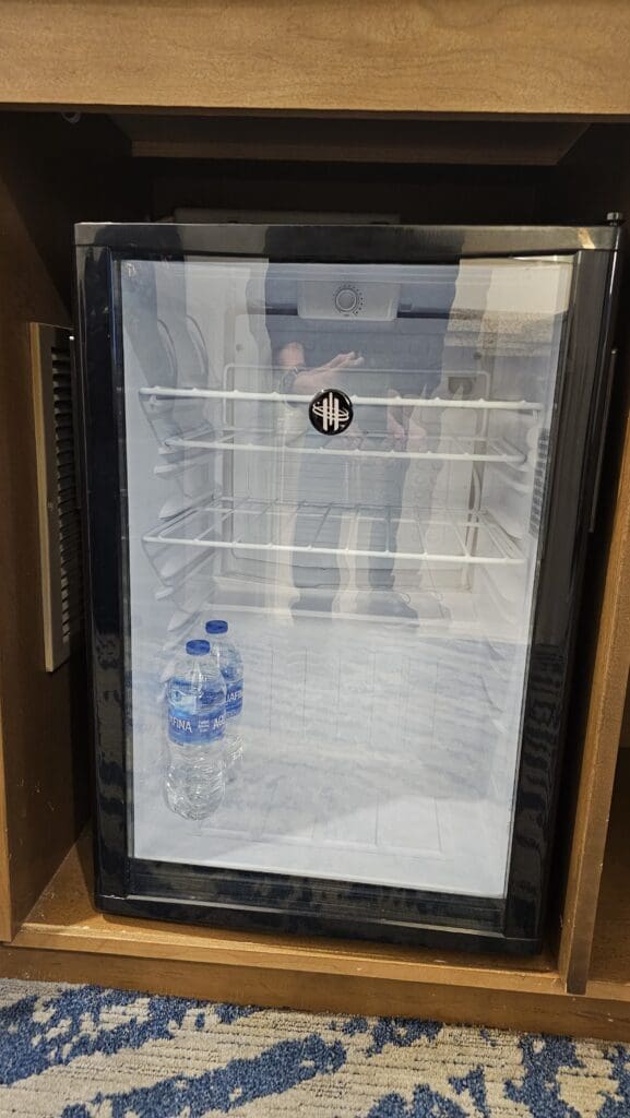 a refrigerator with a glass door